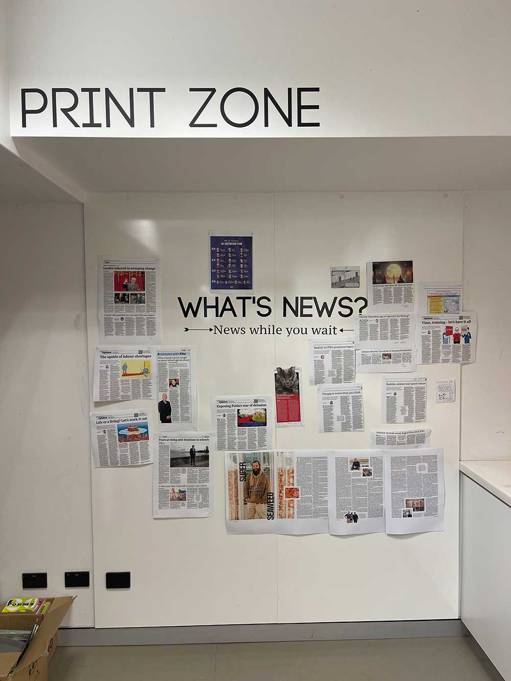 'What's News?' wall in the Print Zone of the Arthur Holt Library